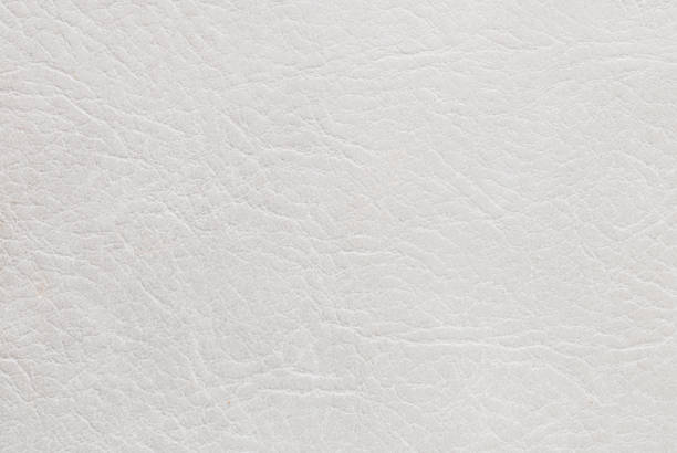 istock Closeup gray leather of old wallet texture background 1002576940