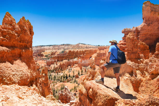 istock Man hiking in the mountains in Utah. 1002580152