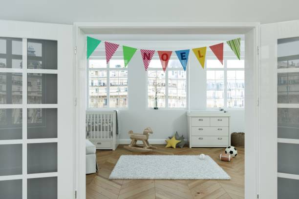 istock modern nursery with decorated Flags with name noel 1002587062