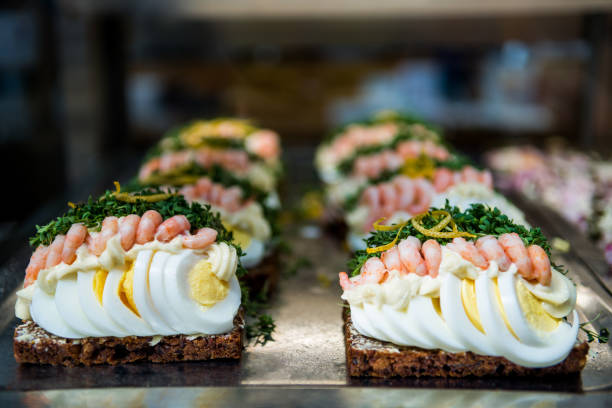 istock selective focus of sandwiches with egg slices and shrimps 1002592382