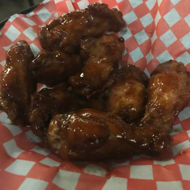 istock Honey garlic chicken wings 1002596048