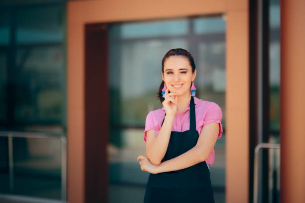 istock Female Restaurant Bar Employee in Front of her Workplace 1002598624