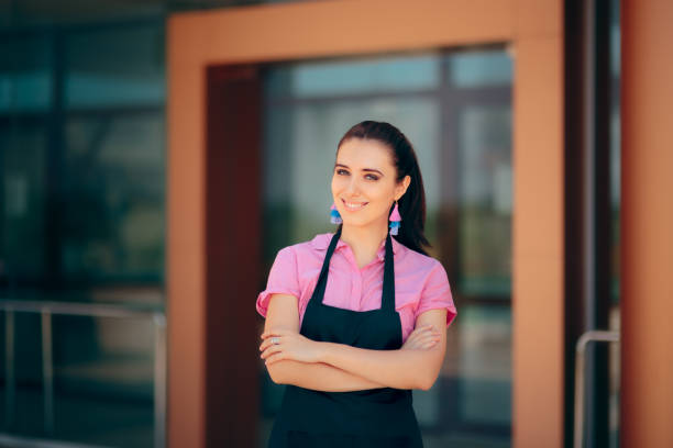 istock Female Restaurant Bar Employee in Front of her Workplace 1002598630