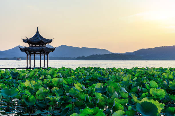 istock Hangzhou west lake jixian pavilion at sunset 1002622222