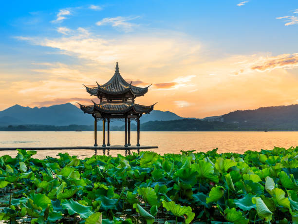 istock Hangzhou west lake jixian pavilion at sunset 1002624920