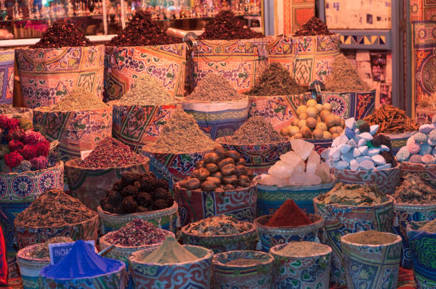 istock Bags with colored spices on the market 1002631300