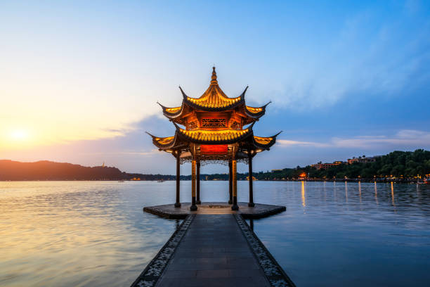 istock Hangzhou west lake jixian pavilion at sunset 1002634242