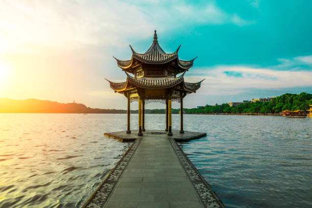 istock Hangzhou west lake jixian pavilion at sunset 1002634876