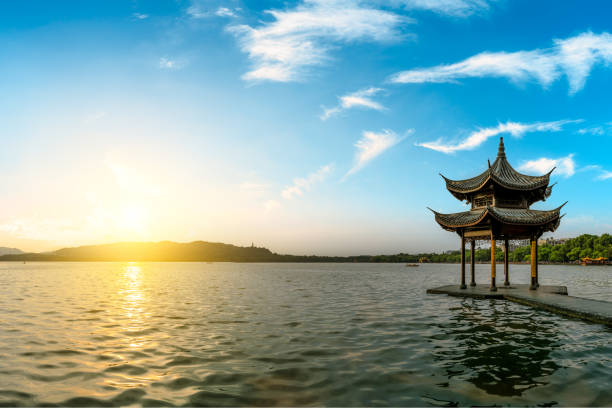 istock Hangzhou west lake jixian pavilion at sunset 1002634918