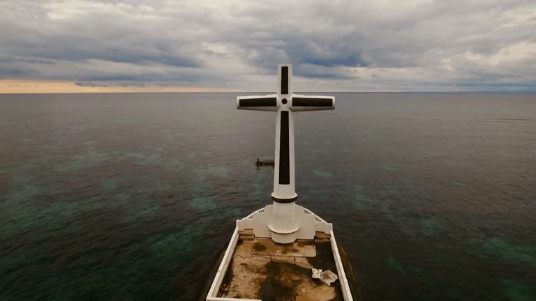 Catholic cross in the sea