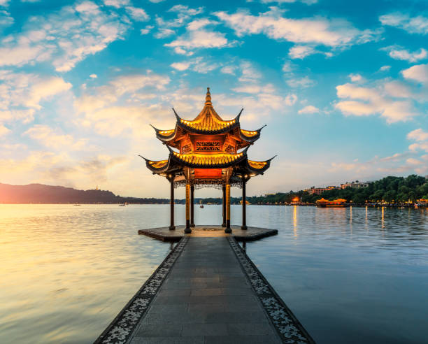 istock Hangzhou west lake jixian pavilion at sunset 1002640522