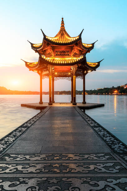 istock Hangzhou west lake jixian pavilion at sunset 1002640598