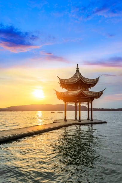 istock Hangzhou west lake jixian pavilion at sunset 1002640972