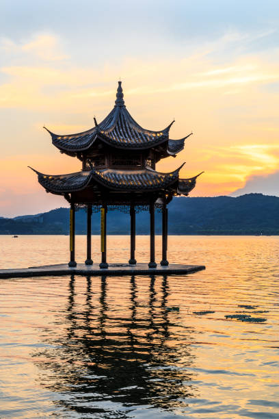 istock Hangzhou west lake jixian pavilion at sunset 1002643532