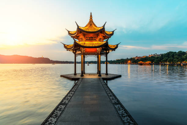 istock Hangzhou west lake jixian pavilion at sunset 1002643536