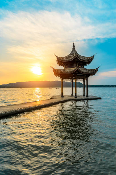 istock Hangzhou west lake jixian pavilion at sunset 1002649974