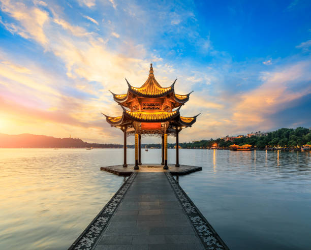 istock Hangzhou west lake jixian pavilion at sunset 1002649978