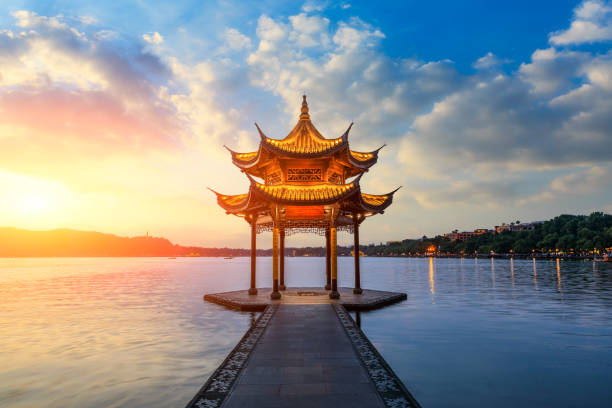 istock Hangzhou west lake jixian pavilion at sunset 1002650534