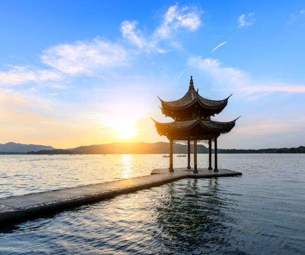 istock Hangzhou west lake jixian pavilion at sunset 1002650724