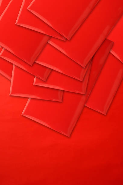 istock Stacked red envelopes on red background 1002650750