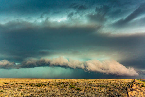 Close view dangerous thunderstorm with gust front and shelf cloud producing hail and torrential rain