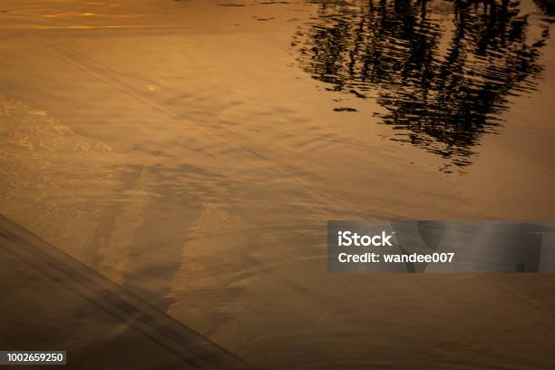 Silhouette Of Swimming Pool During Sunset Stock Photo - Download Image Now - Architecture, Colors, Dusk