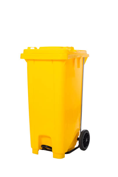 istock yellow recycle bins isolated on white background with clipping path 1002659830
