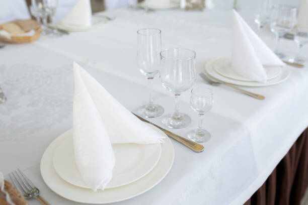 istock Table with decoration dish cutlery in bright room nature light 1002667922