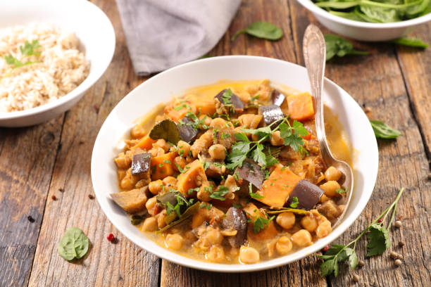 istock aubergine curry and rice 1002673798