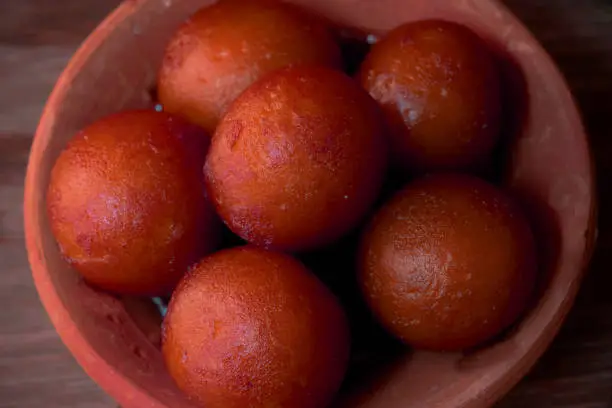 Indian Sweet Gulabjamun is a sweet Bangali syruph Dessert