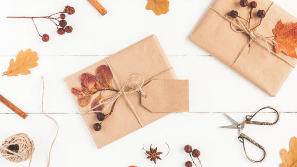 istock Autumn composition on wooden white background. Flat lay, top view 1002678036