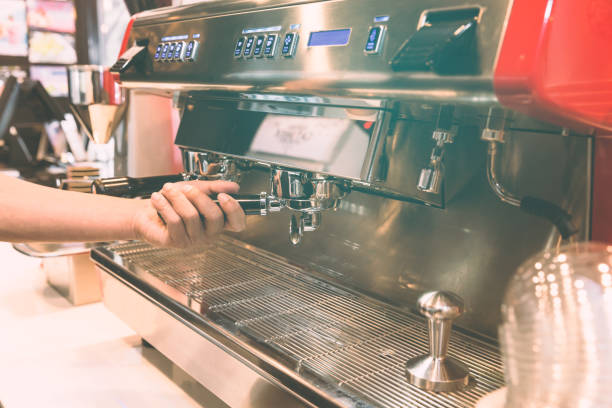 istock Barista made drink by coffee machine with vintage tone. 1002681198