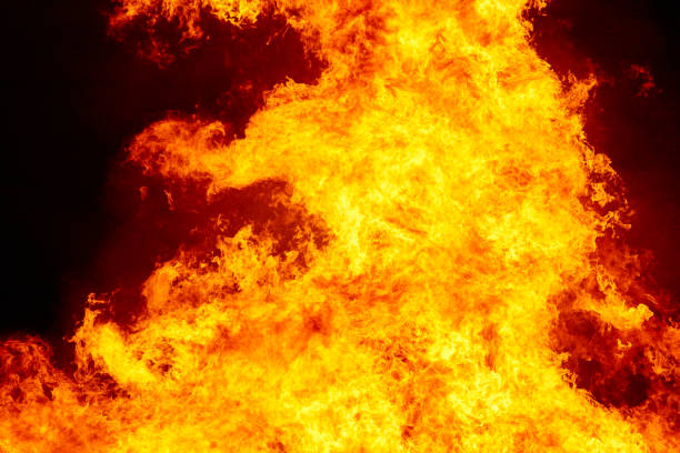 istock Fire flames detail. Fireman emergency. Carbon emission 1002684104