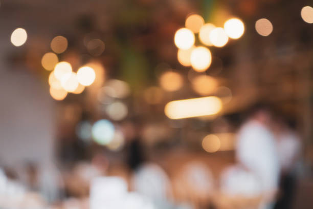 istock cafe restaurant with abstract bokeh lights defocused blur background 1002689636
