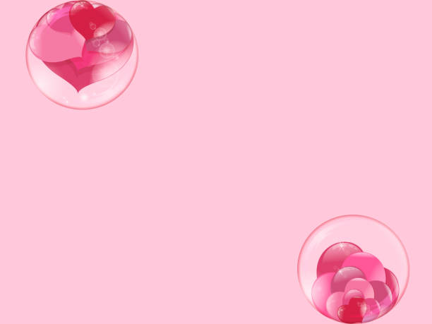 istock hearts lie inside a transparent glass bowl and a bubble flies with hearts inside on a pink background 1002689818