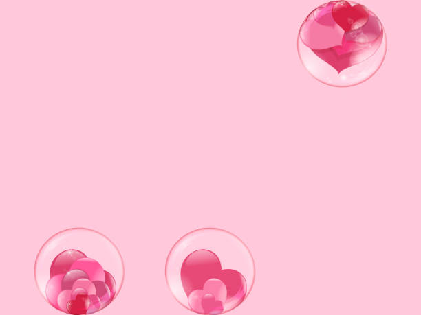 istock hearts lie inside transparent glass balls and a bubble flies with hearts inside on a pink background 1002691924