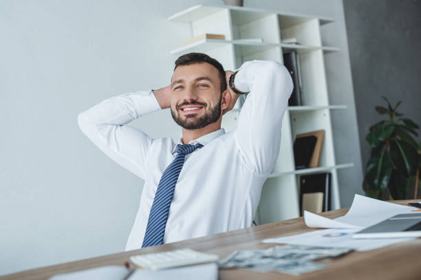 istock happy business adviser resting on chair in office 1002705096