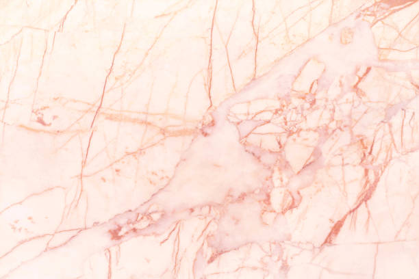 istock rose gold marble wall texture for background and design art work, seamless pattern of tile stone with bright luxury. 1002706264
