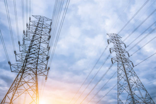 istock Electricity concept. Close up high voltage power lines station. 1002706372
