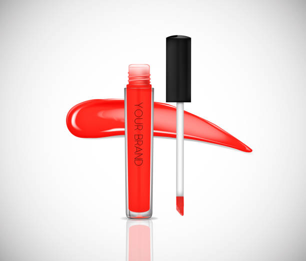 istock Red Liquid lipstick, Lip gloss in elegant glass bottle with black lid, closed and open container with brush, isolated . Make up smear. 1002710418