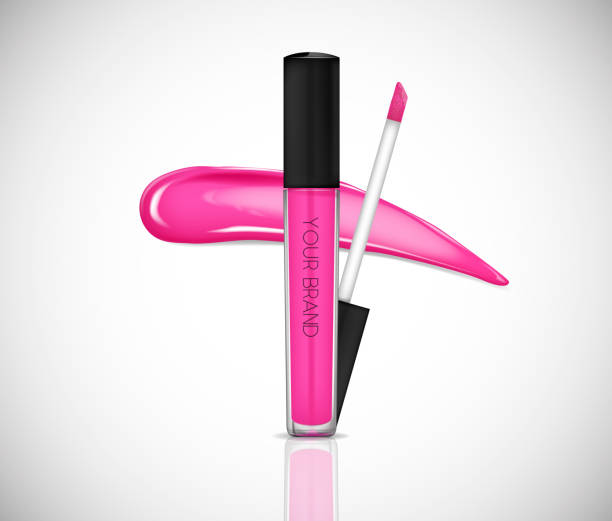 istock Pink Liquid lipstick, Lip gloss in elegant glass bottle with black lid, closed and open container with brush, isolated . Make up smear. 1002713344