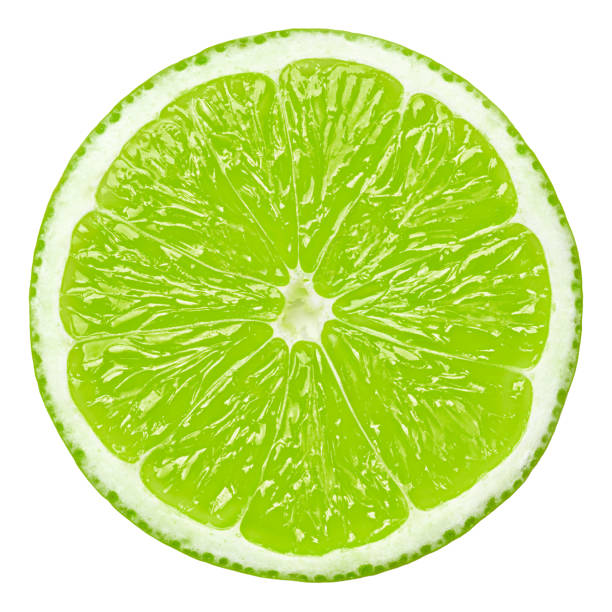 rebanada de la cal, clipping path, aislado sobre fondo blanco - lime wedge fotografías e imágenes de stock