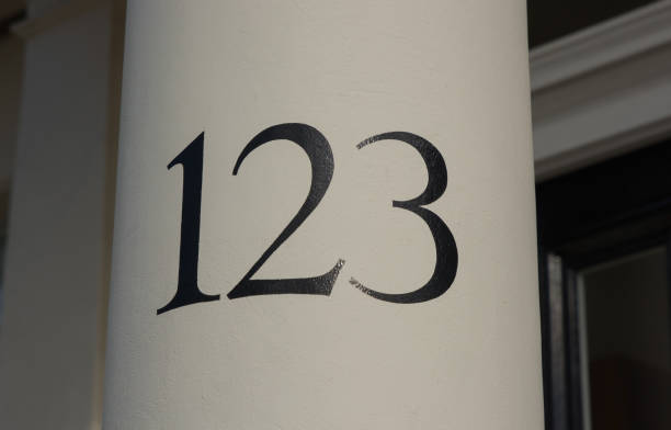 istock House number one hundred and twenty three 1002714680