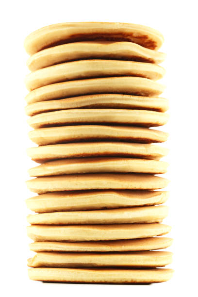istock Tasty pancakes isolated on white 1002718320