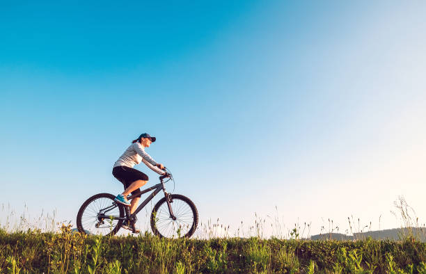 istock Woman ride a bicykle 1002719028