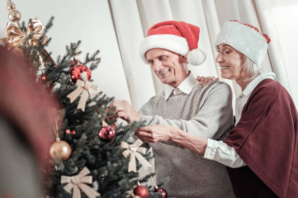 istock Pretty old woman embracing her man 1002723976