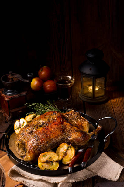 istock Duck on old Polish roasted with thyme and Apple 1002728490
