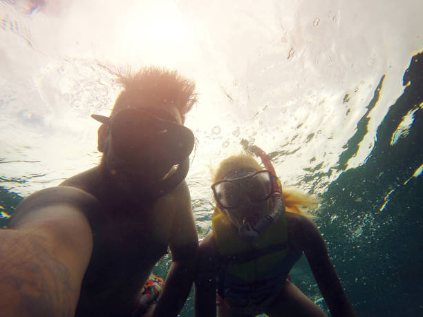 istock Couple Snorkeling on Maldives 1002732980