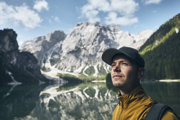 istock Young tourist in mountains 1002733218