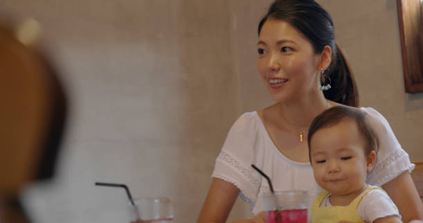 istock Family having lunch at the cafe. 1002737734